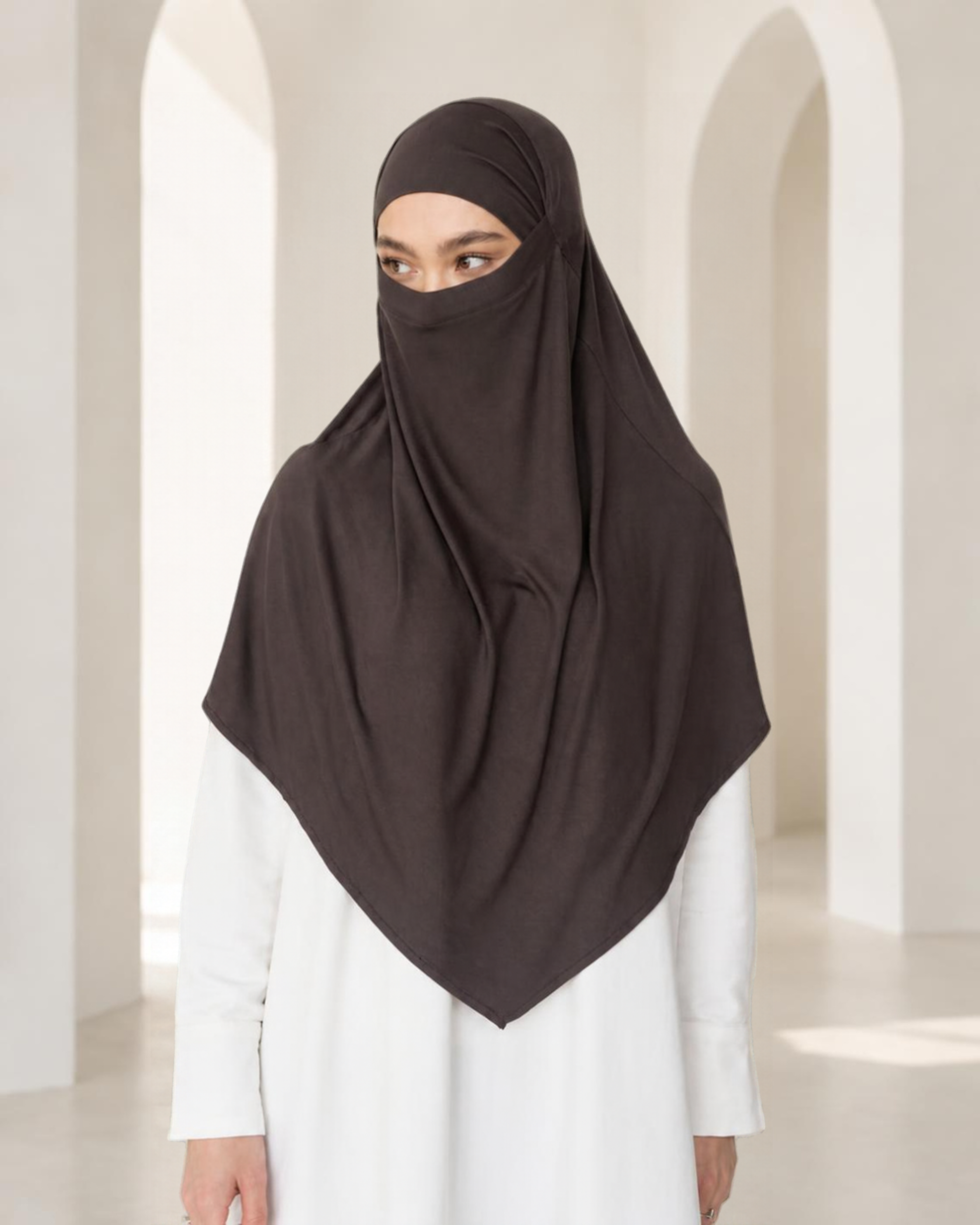 Khadijah Khimar in Brown styled with an ivory abaya
