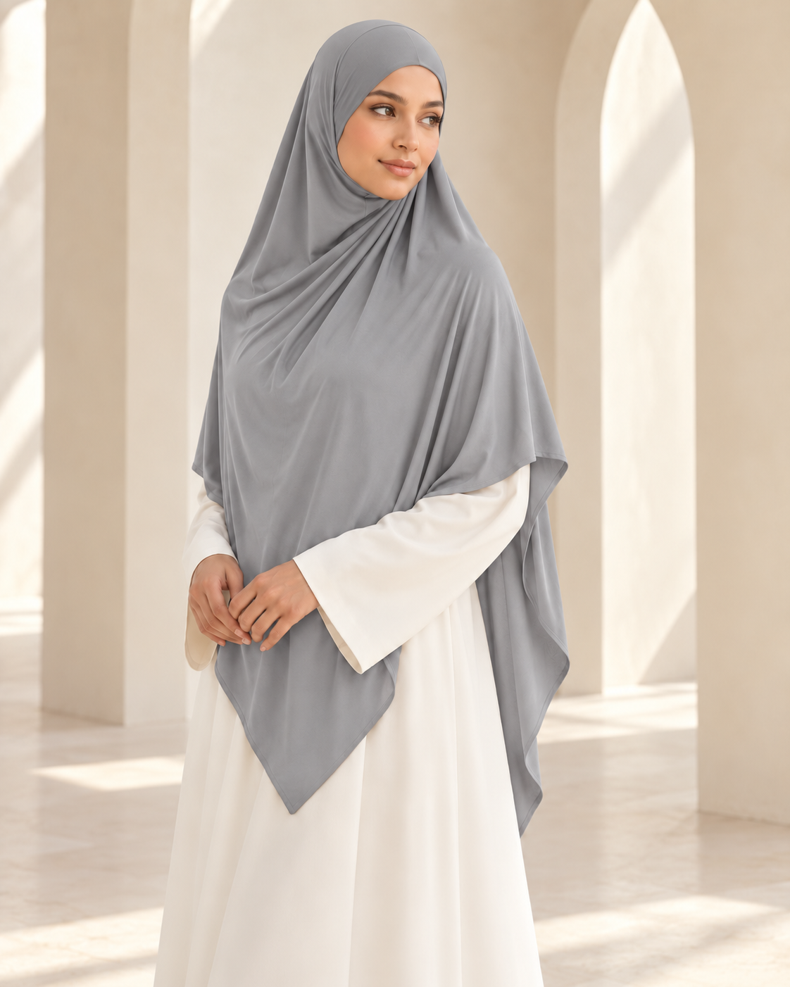 Khadijah Khimar in Grey styled with an ivory abaya