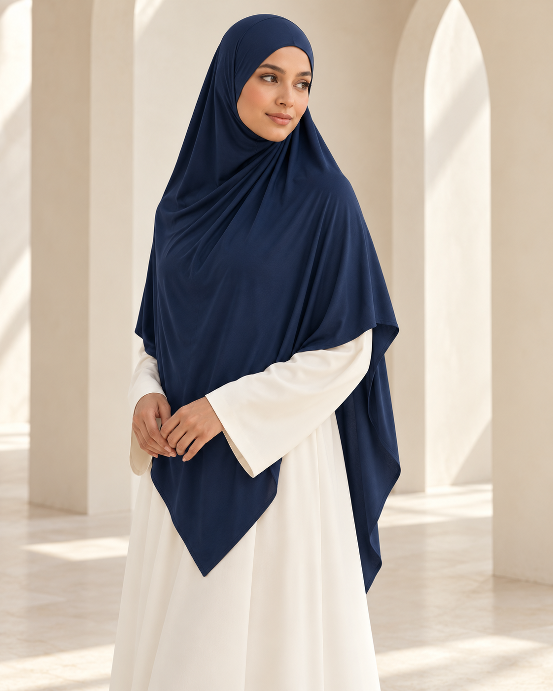 Khadijah Khimar in Navy styled with an ivory abaya